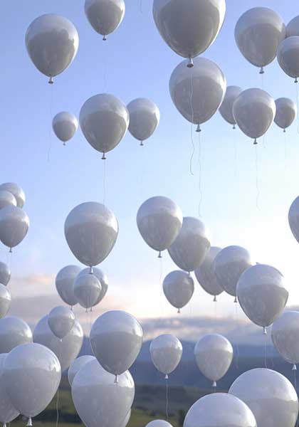 Soltar balões brancos no Réveillon ©Freepik