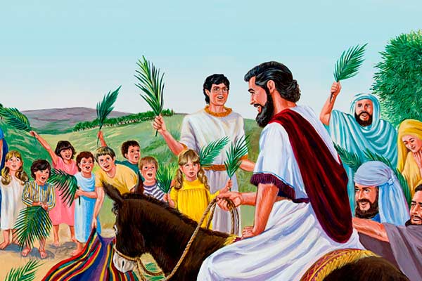 Jesus entrando em Jerusalém em um jumento, com a multidão agitando ramos de palmeira ©JW.org